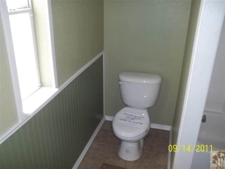 13442 Ocotillo Road Whitewater, CA 92282 - Photo 10 of 14 a close up of a toilet