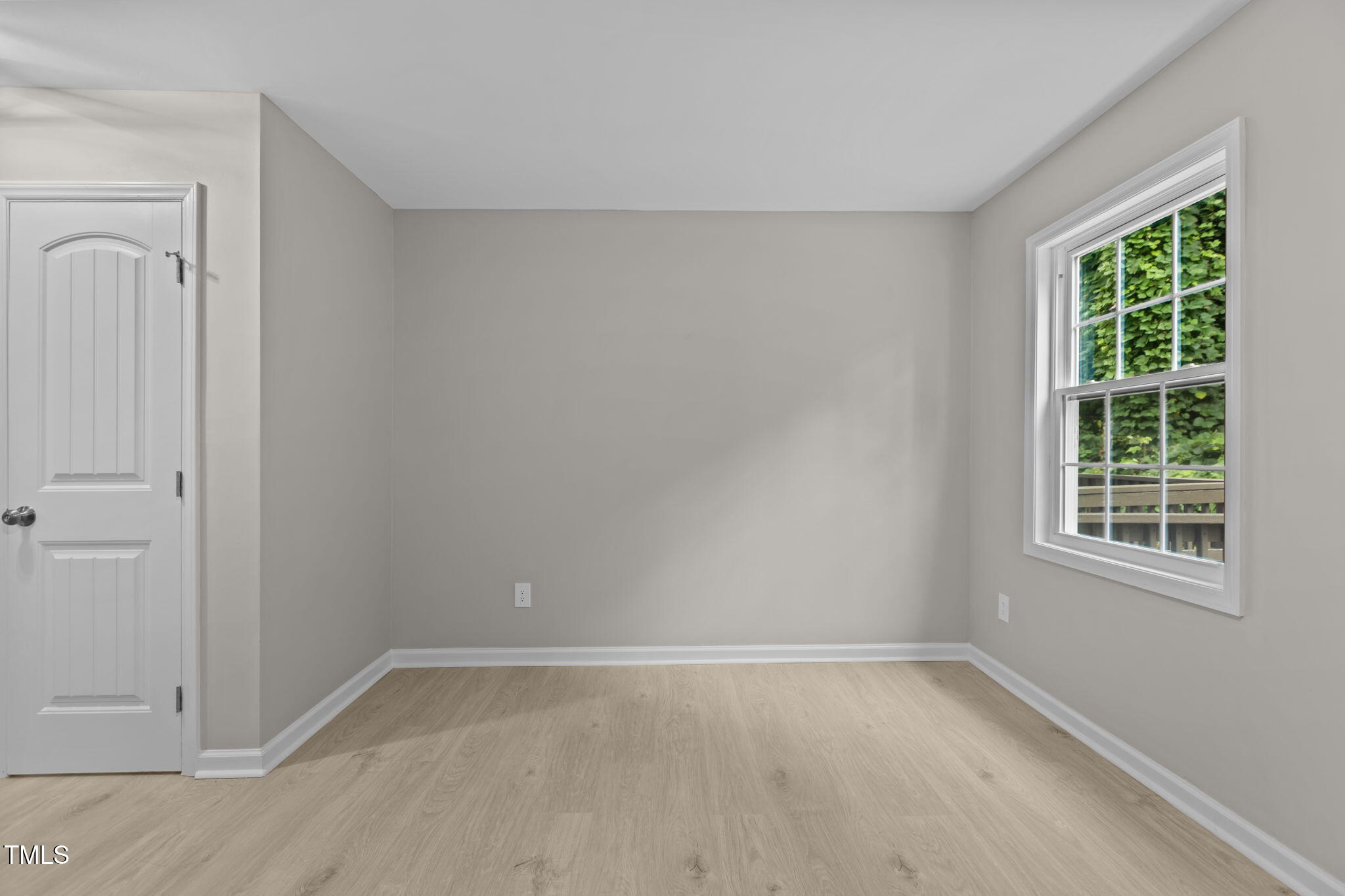 1433 Cherrycrest Drive Durham, NC 27704 - Photo 19 of 40 an empty room with a window