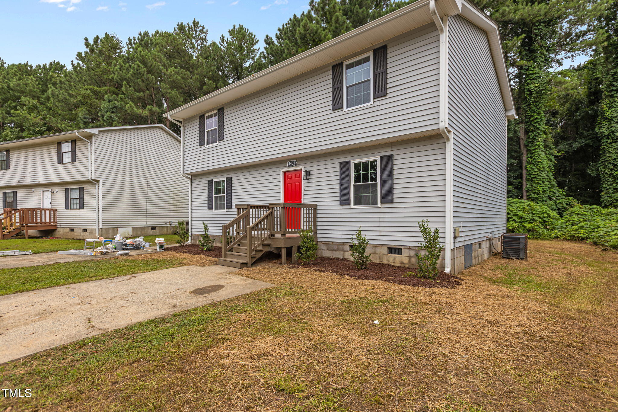 1433 Cherrycrest Drive Durham, NC 27704 - Photo 29 of 40 a view of a house with backyard and a tree