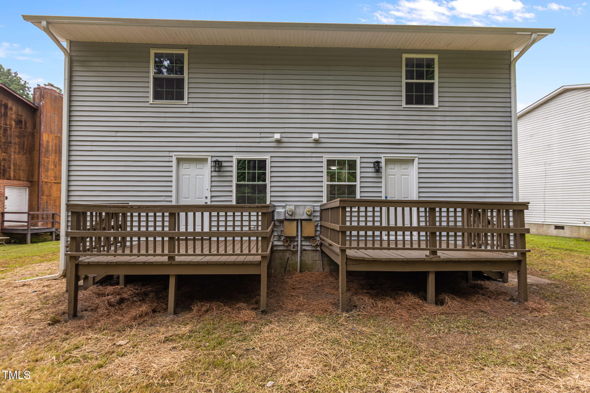 1433 Cherrycrest Drive Durham, NC 27704 - Photo 31 of 40 a view of a deck with a bench