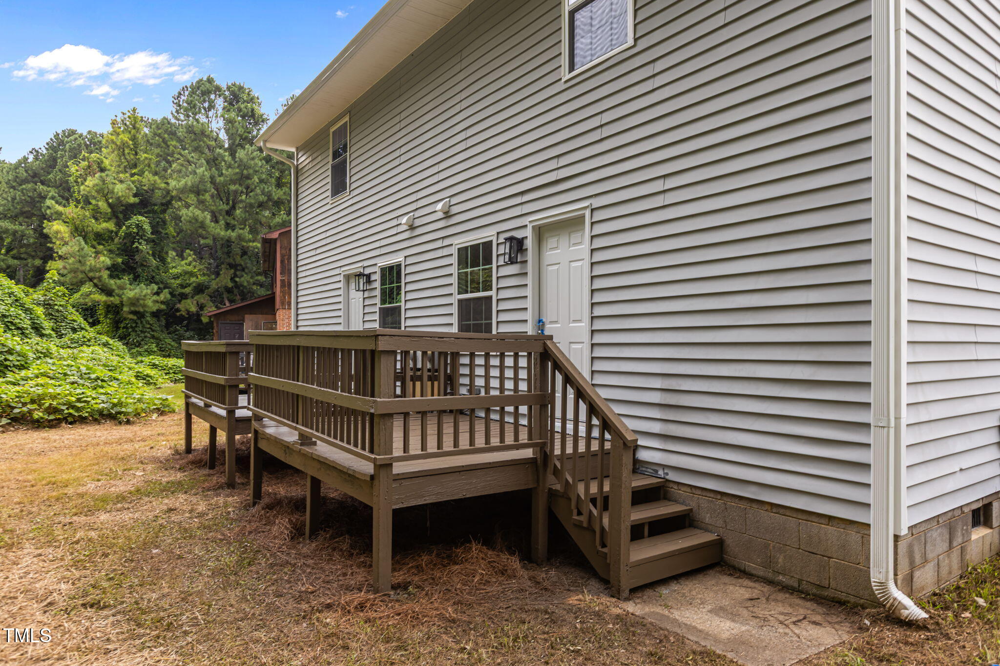 1433 Cherrycrest Drive Durham, NC 27704 - Photo 32 of 40 a view of a chair in wooden deck
