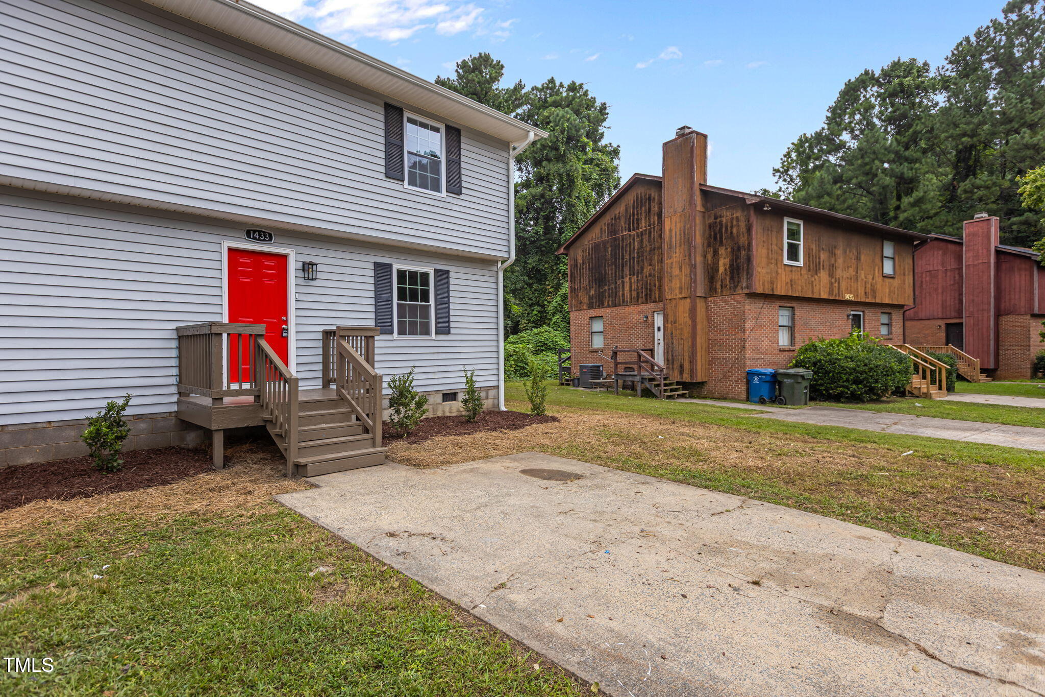 1433 Cherrycrest Drive Durham, NC 27704 - Photo 36 of 40 a view of a house with backyard and sitting area