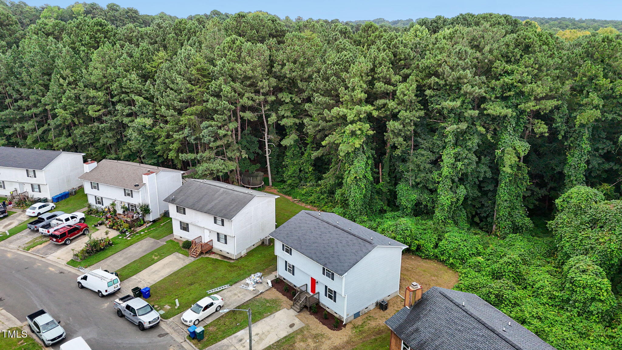 1433 Cherrycrest Drive Durham, NC 27704 - Photo 37 of 40 an aerial view of a house with a garden