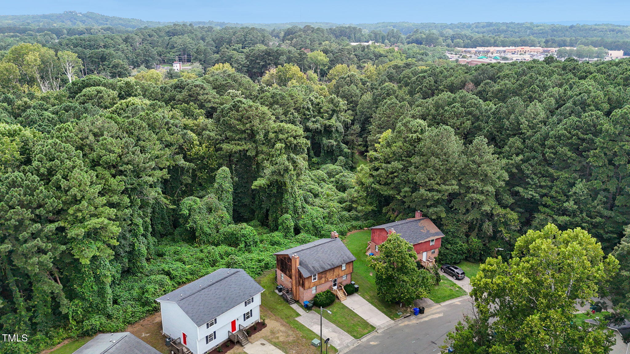 1433 Cherrycrest Drive Durham, NC 27704 - Photo 39 of 40 an aerial view of a house with yard