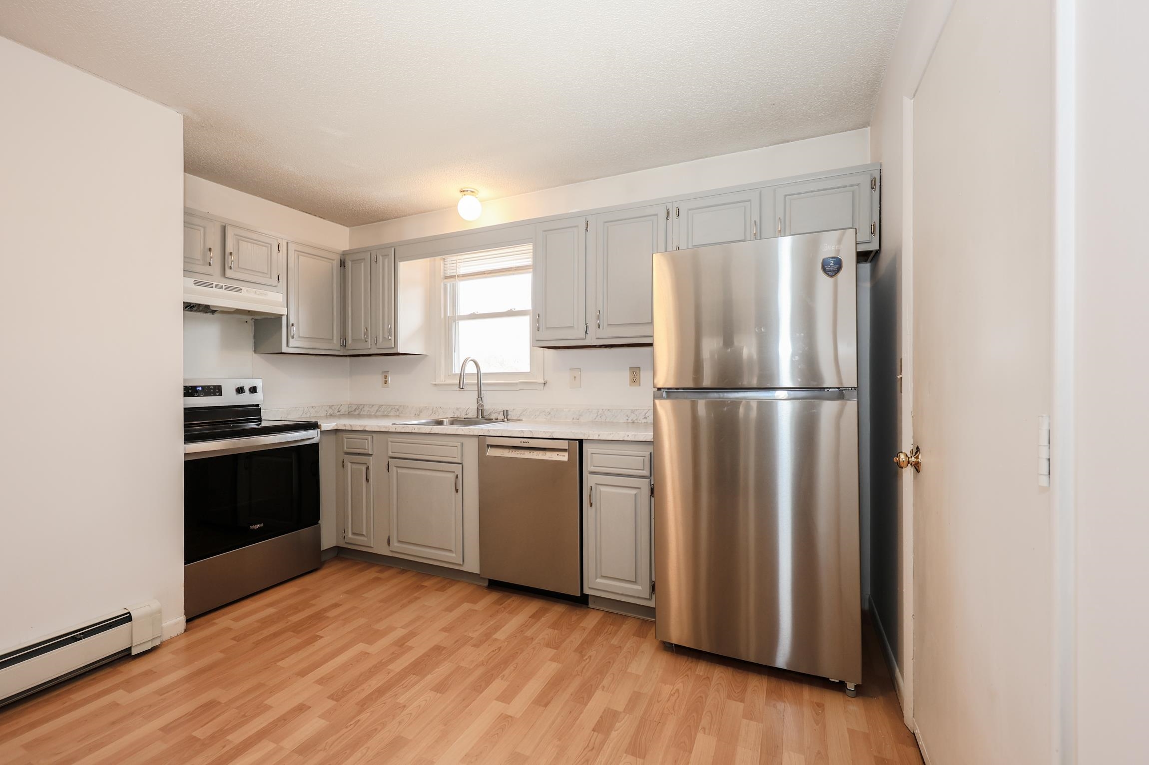 811 Mammoth Road, Unit C Manchester, NH 03104 - Photo 1 of 19