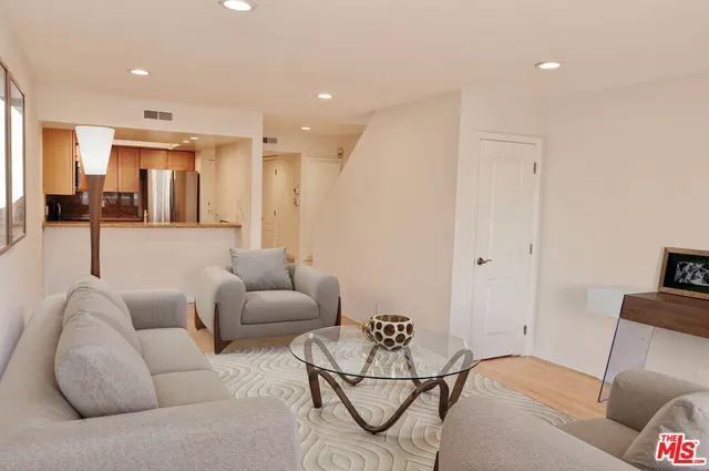 a living room with furniture and a couch