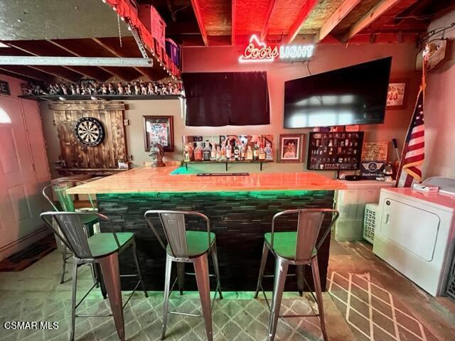 9333 Rowell Avenue Chatsworth, CA 91311 - Photo 18 of 25 a patio with a table and chairs and potted plants