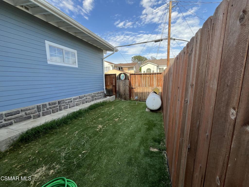 9333 Rowell Avenue Chatsworth, CA 91311 - Photo 22 of 25 a view of a backyard with barn and plants