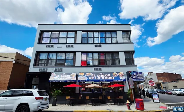 a car parked in front of a building