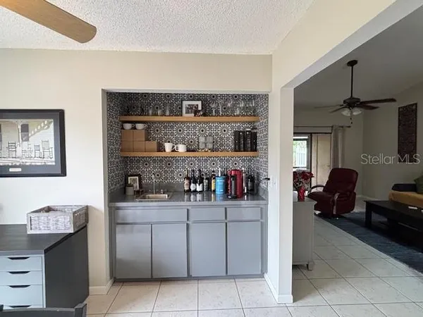 a room with a cabinets and washer dryer