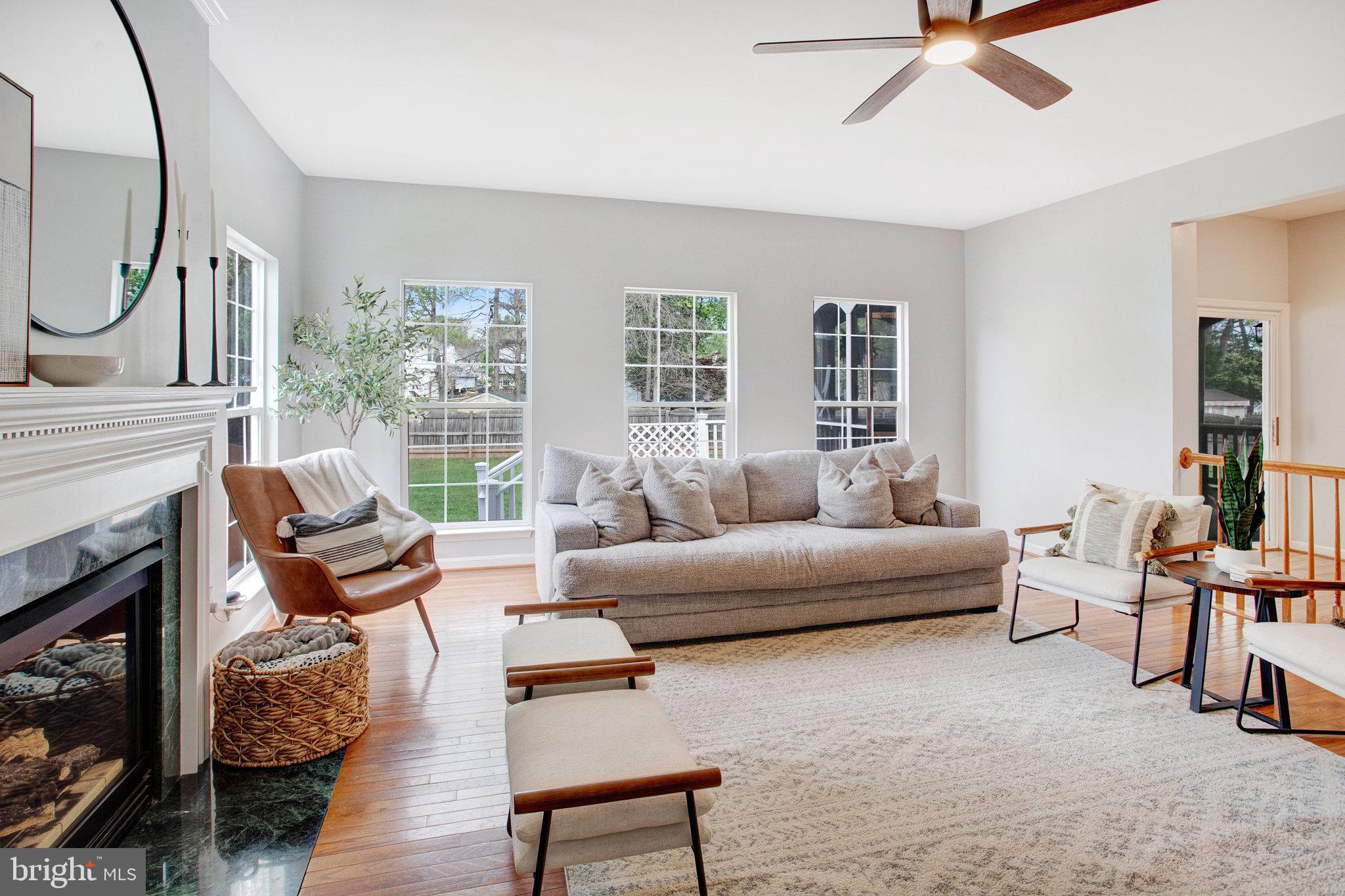 10375 Navarone Place Manassas, VA 20110 - Photo 15 of 51 a living room with furniture and a fireplace