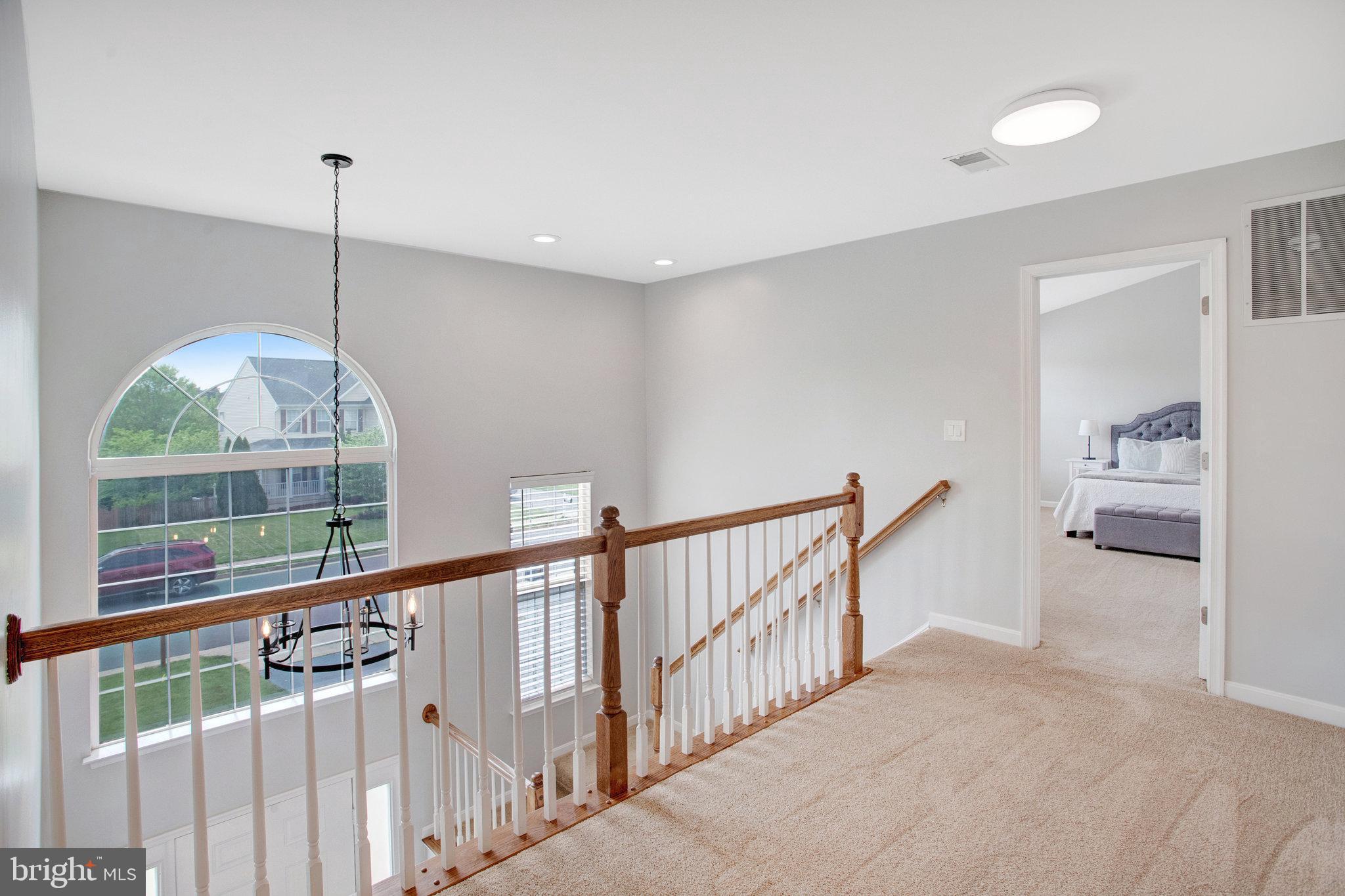 10375 Navarone Place Manassas, VA 20110 - Photo 20 of 51 a view of a living room and a window