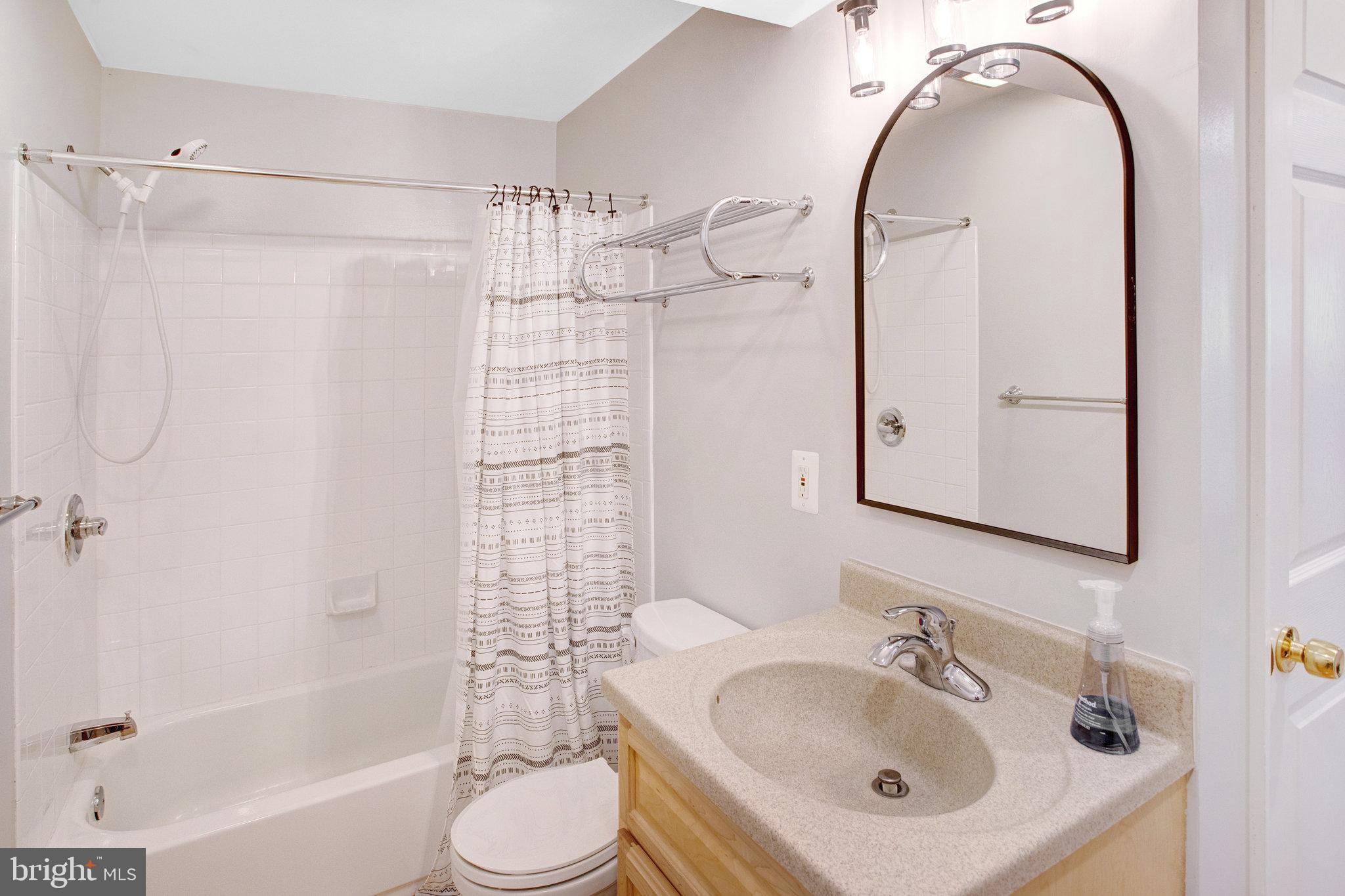 10375 Navarone Place Manassas, VA 20110 - Photo 36 of 51 a bathroom with a sink toilet and shower