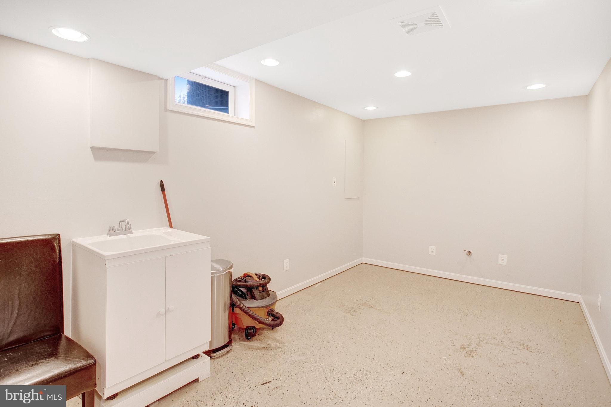 10375 Navarone Place Manassas, VA 20110 - Photo 39 of 51 a room with storage and utility