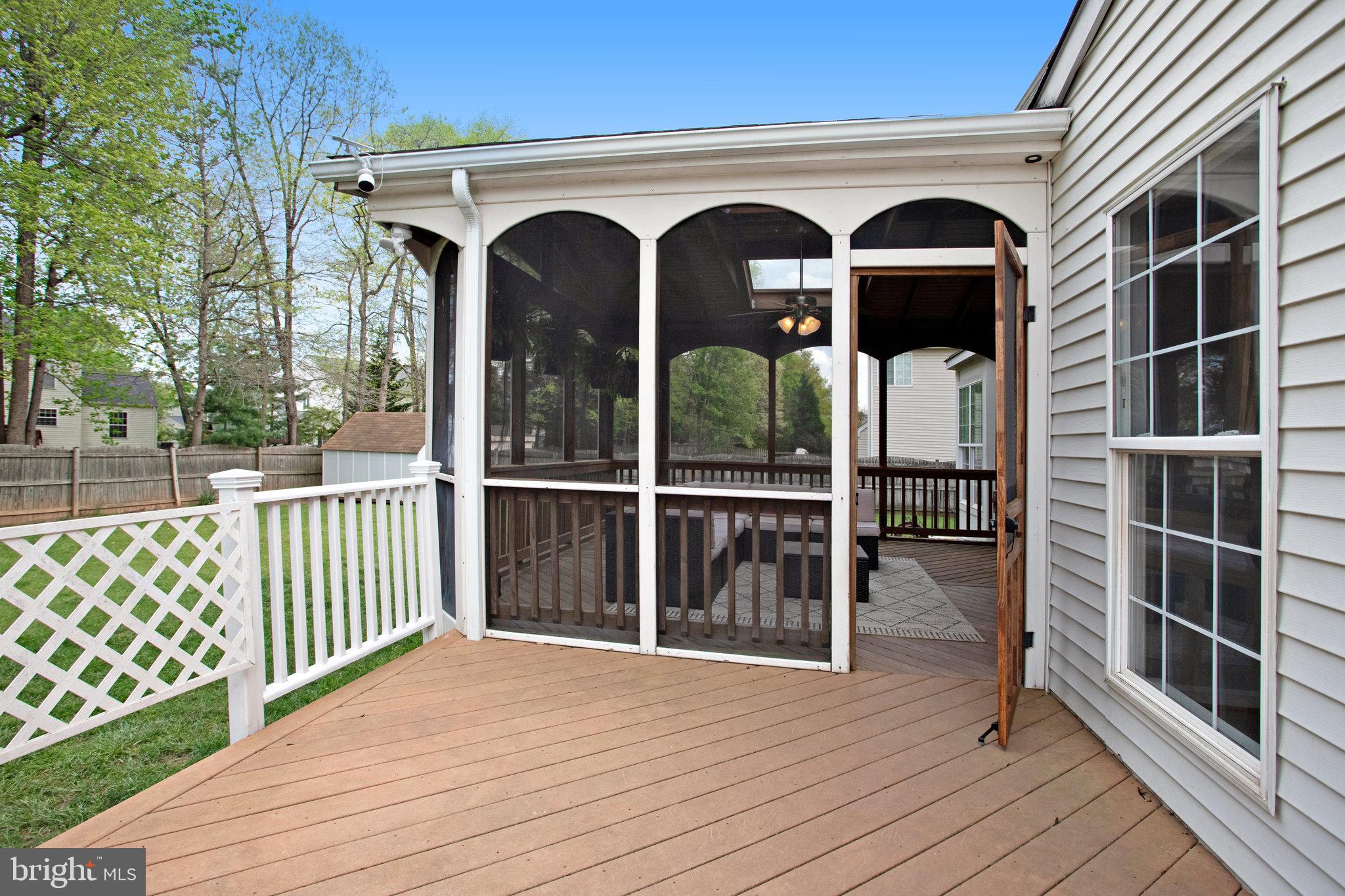 10375 Navarone Place Manassas, VA 20110 - Photo 42 of 51 a view of a house with wooden deck