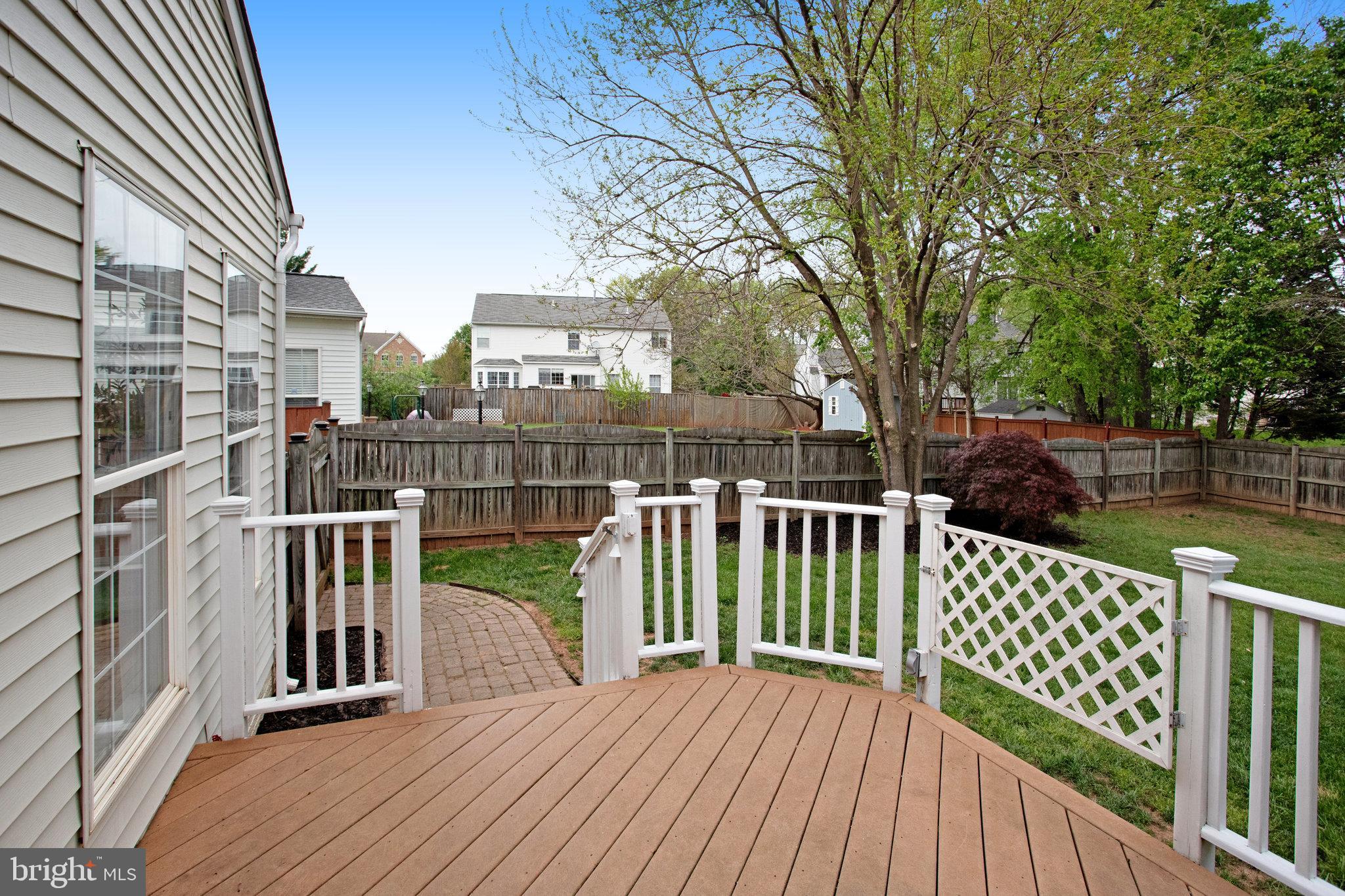 10375 Navarone Place Manassas, VA 20110 - Photo 43 of 51 a view of a house with wooden deck