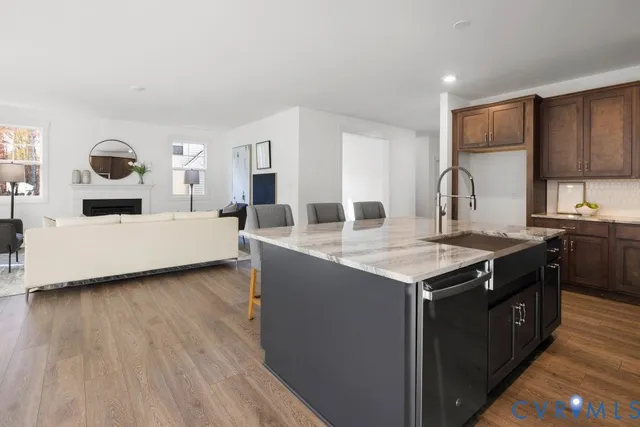 a kitchen with a stove and a sink