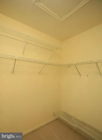 a view of a room with racks on the wall