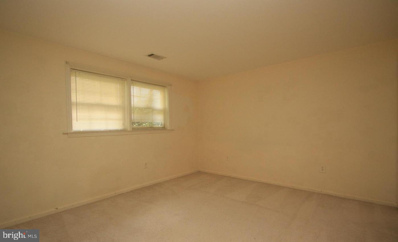 6323 Millwood Circle Springfield, VA 22152 - Photo 15 of 20 a view of an empty room with a window