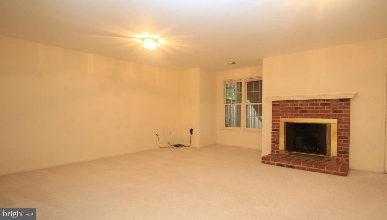 6323 Millwood Circle Springfield, VA 22152 - Photo 16 of 20 a view of empty room with fireplace