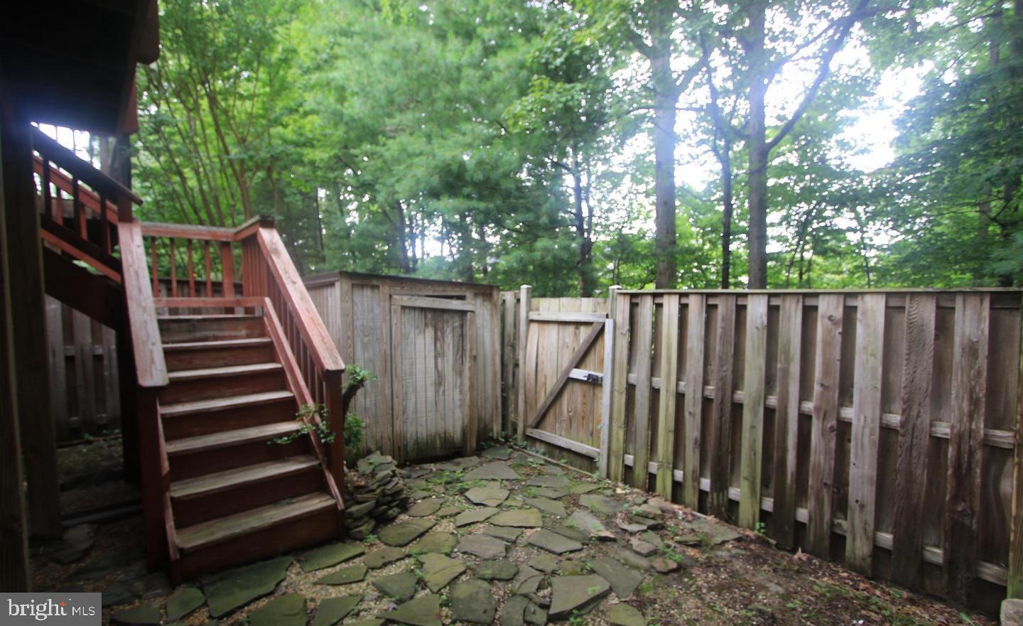 6323 Millwood Circle Springfield, VA 22152 - Photo 19 of 20 a view of outdoor space with deck and yard