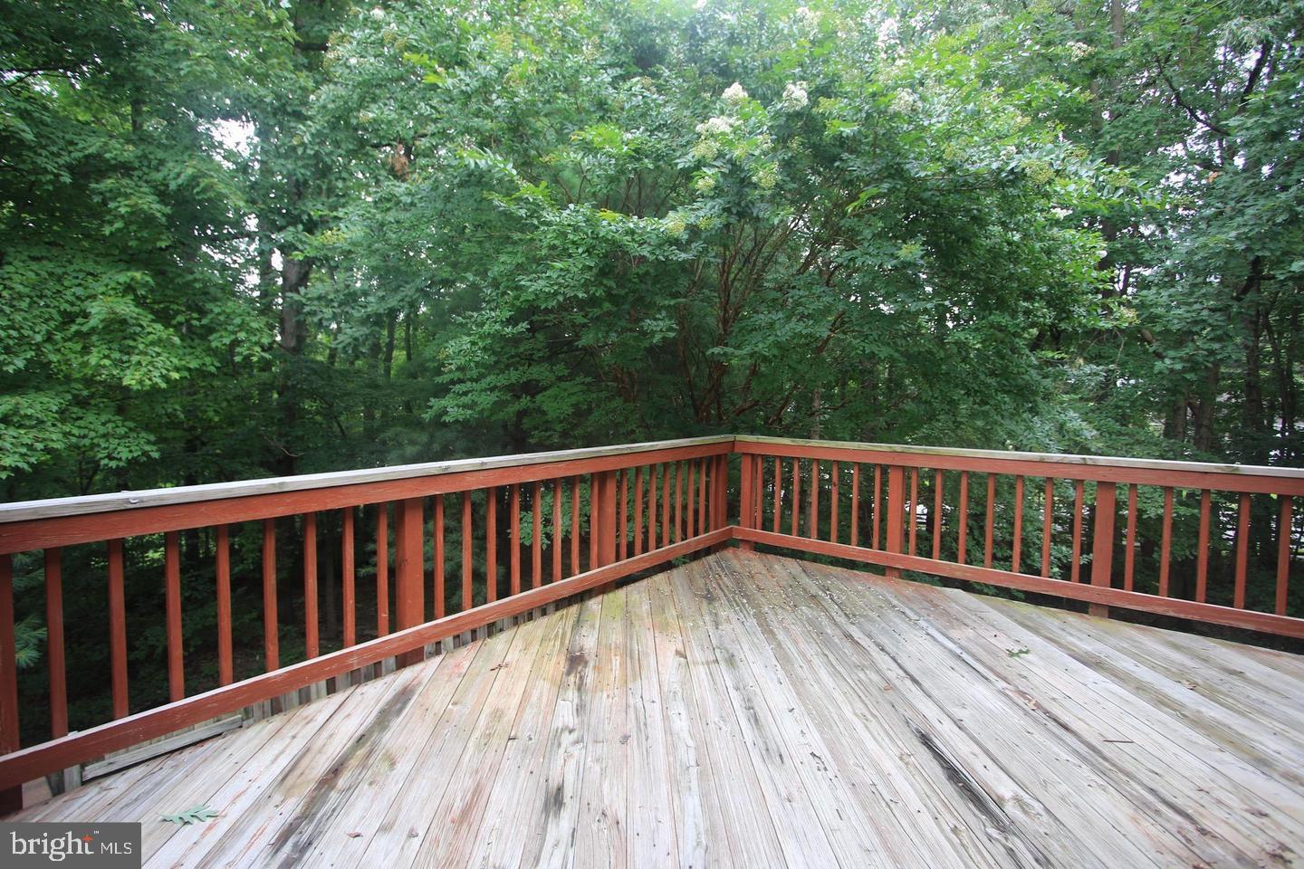 6323 Millwood Circle Springfield, VA 22152 - Photo 6 of 20 a view of balcony with wooden floor