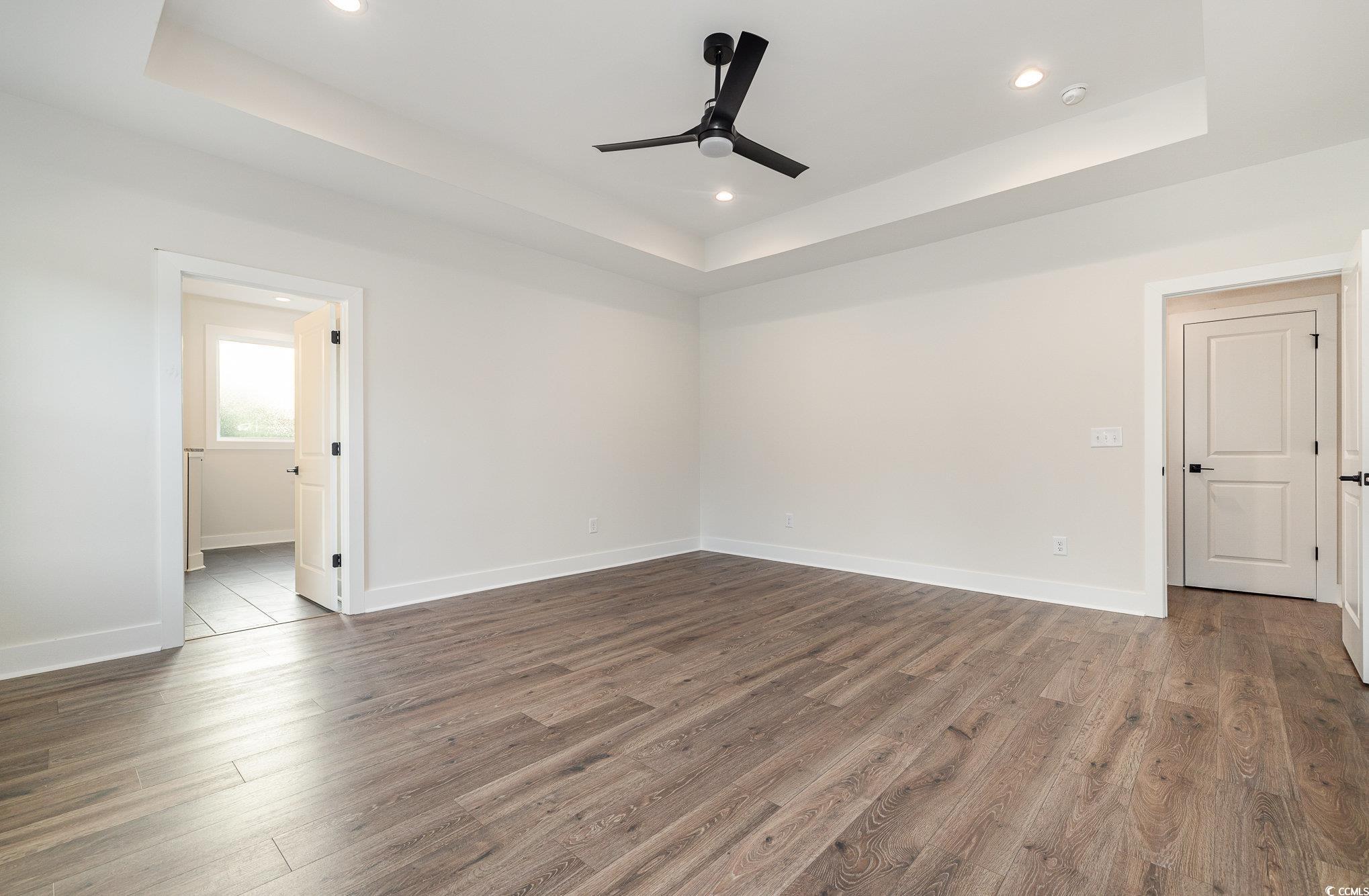 983 Pisgah Church Road Aynor, SC 29511 - Photo 20 of 37 Unfurnished room with a ceiling fan, wood finished