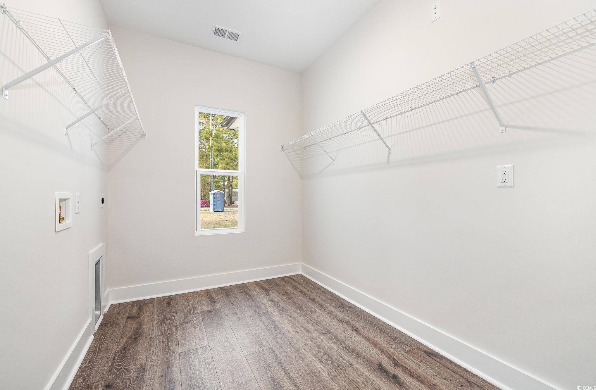983 Pisgah Church Road Aynor, SC 29511 - Photo 23 of 37 Spacious closet featuring visible vents and wood f