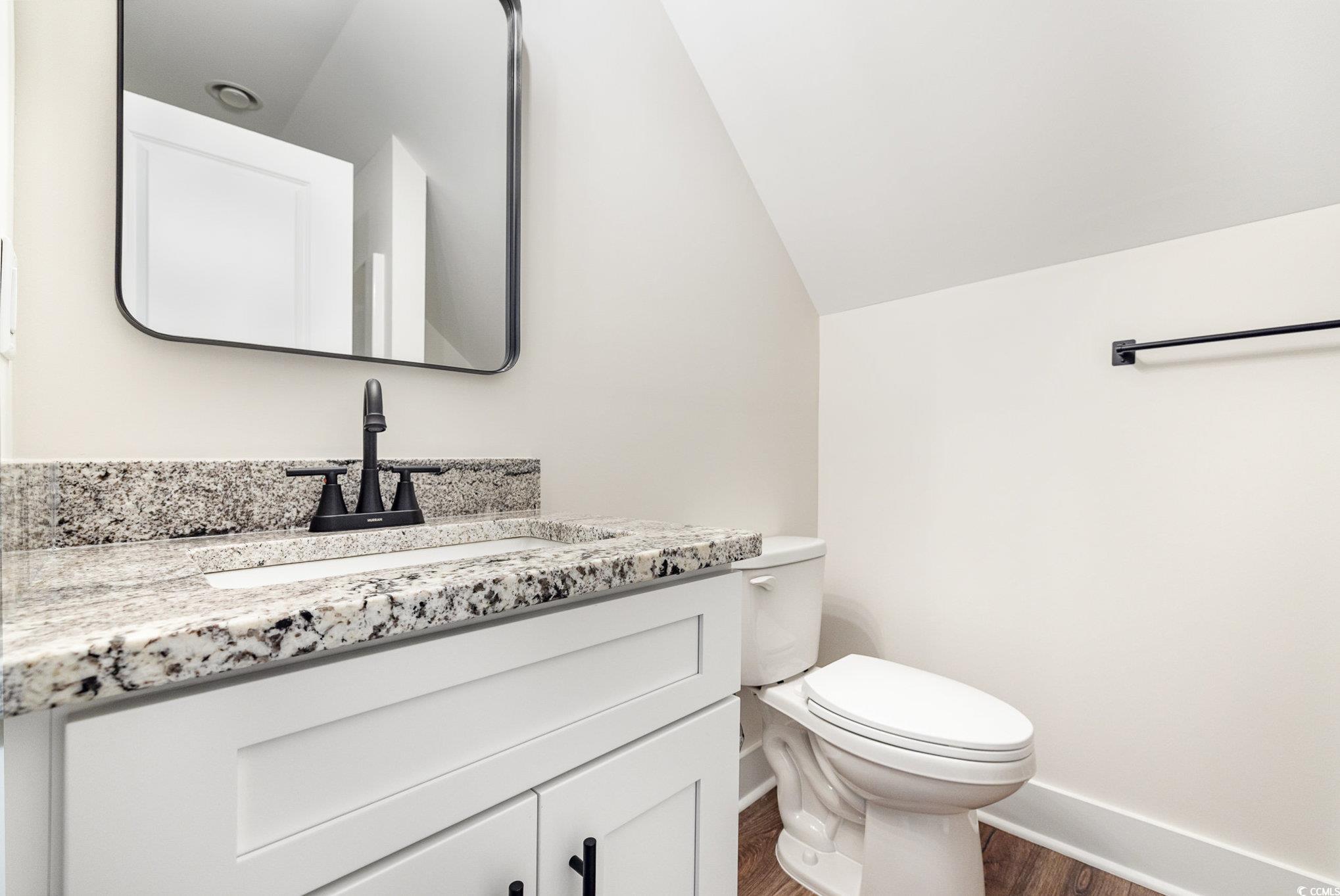 983 Pisgah Church Road Aynor, SC 29511 - Photo 30 of 37 Bathroom featuring baseboards, toilet, wood finish