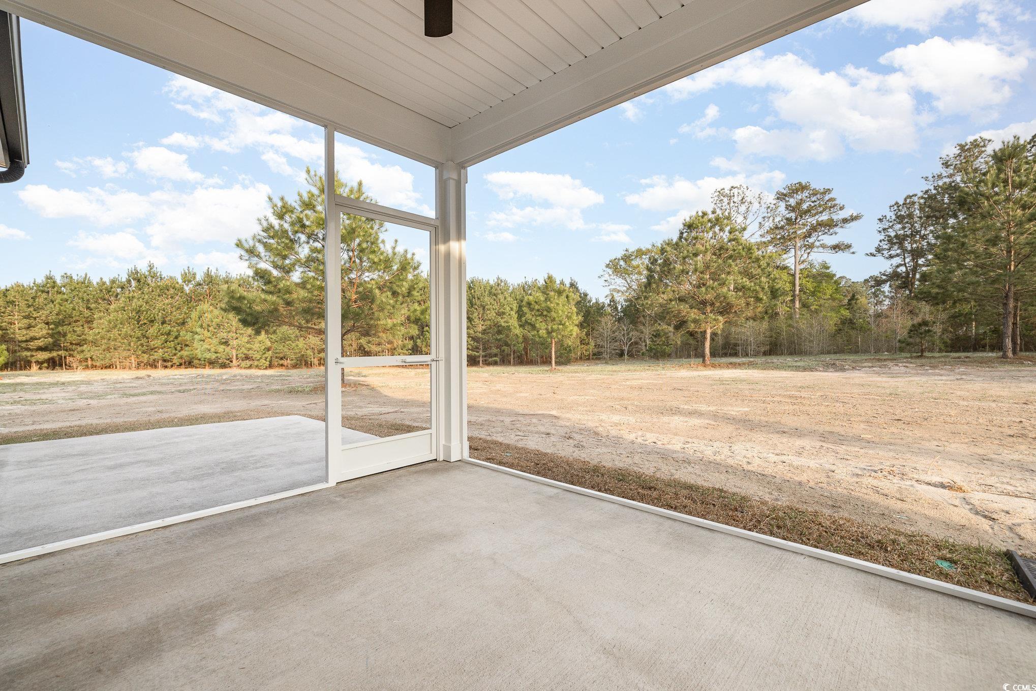 983 Pisgah Church Road Aynor, SC 29511 - Photo 35 of 37 Unfurnished sunroom with a ceiling fan