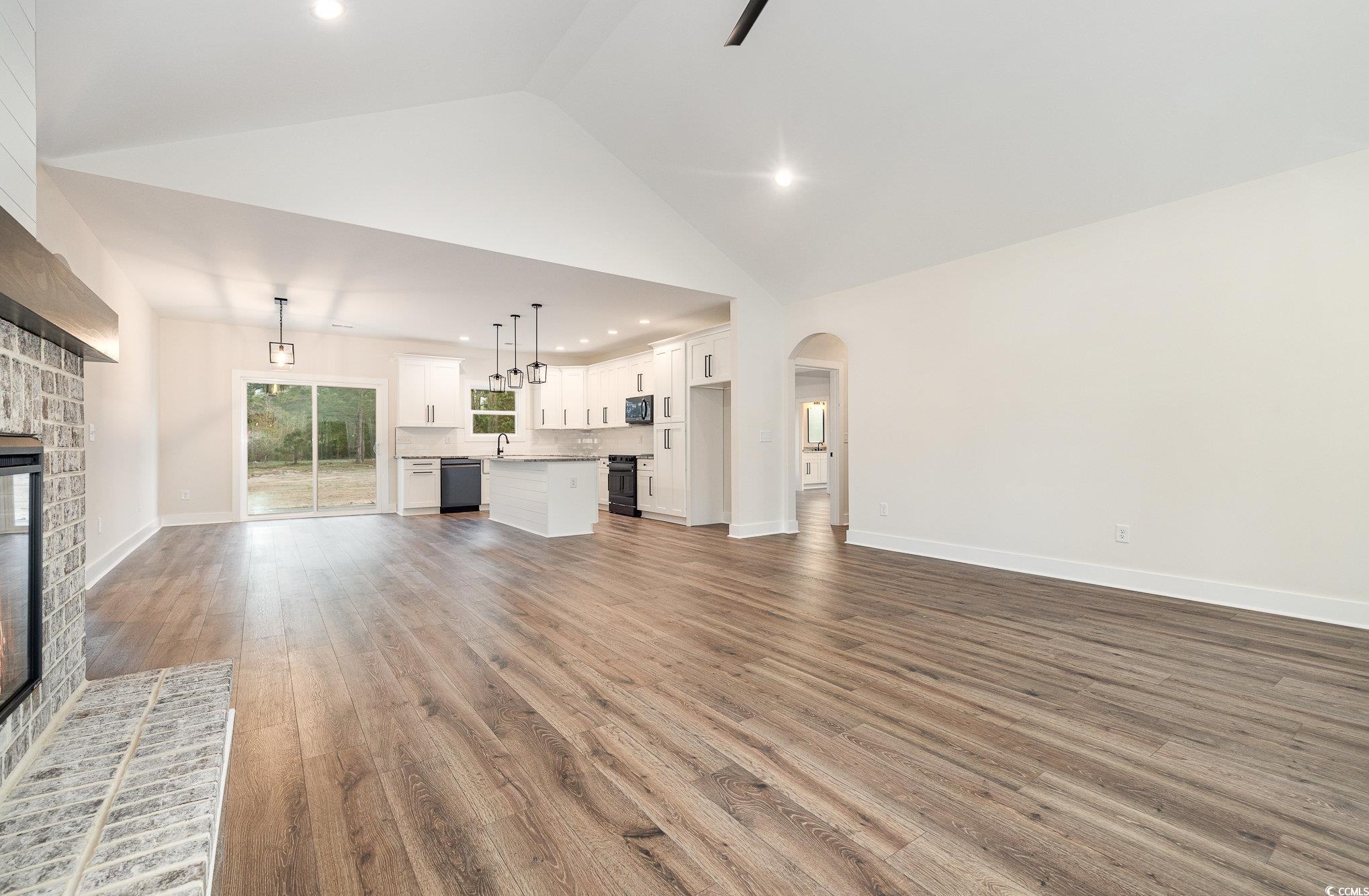 983 Pisgah Church Road Aynor, SC 29511 - Photo 10 of 37 Unfurnished living room featuring high vaulted cei