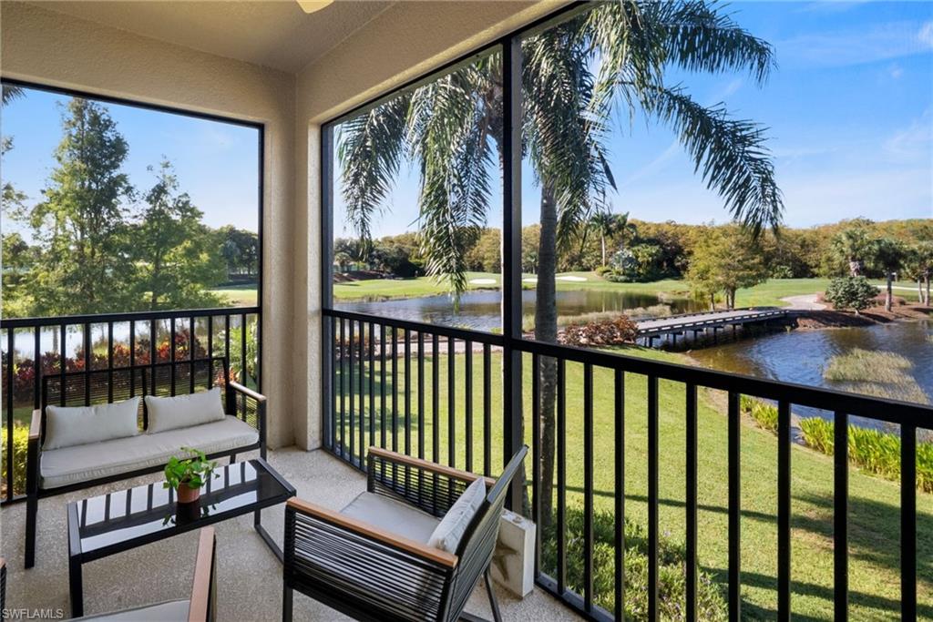 10265 Heritage Bay Boulevard, Unit 622 Naples, FL 34120 - Photo 4 of 50 a view of a two chairs in the balcony