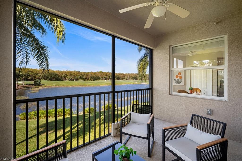 10265 Heritage Bay Boulevard, Unit 622 Naples, FL 34120 - Photo 6 of 50 a view of a chairs and table in a balcony