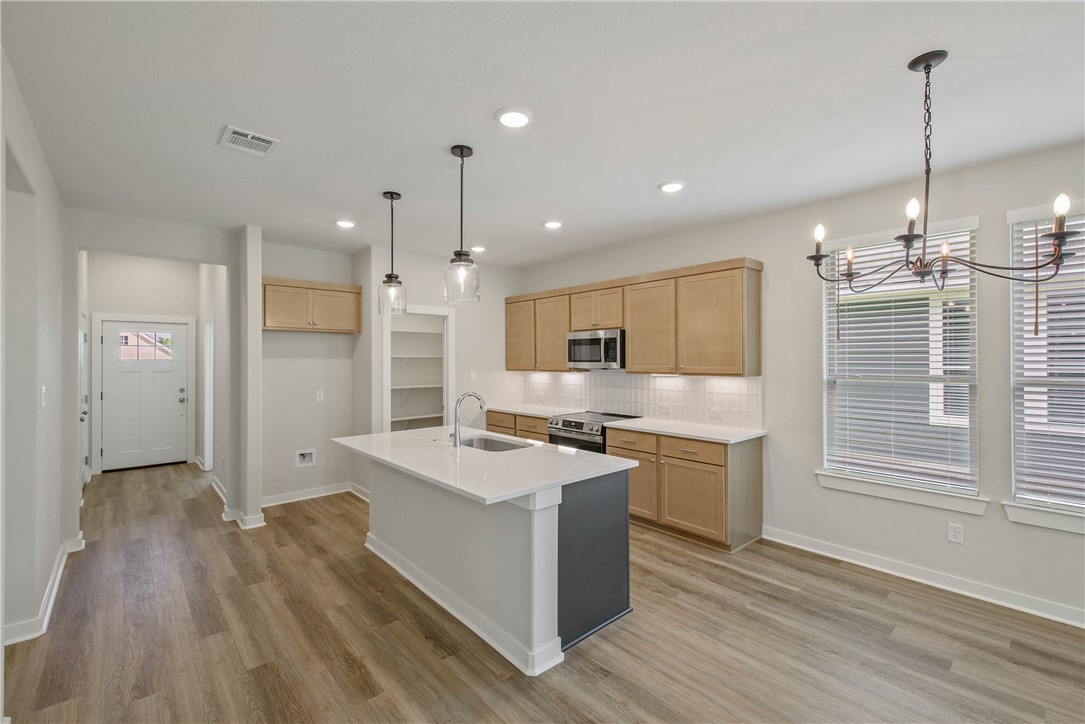 2776 Messenger Way Bryan, TX 77803 - Photo 6 of 18 Photos depict previously completed Emily with elevation A. Selections and finishes may vary; please contact an RNL sales team for the latest information on this home.