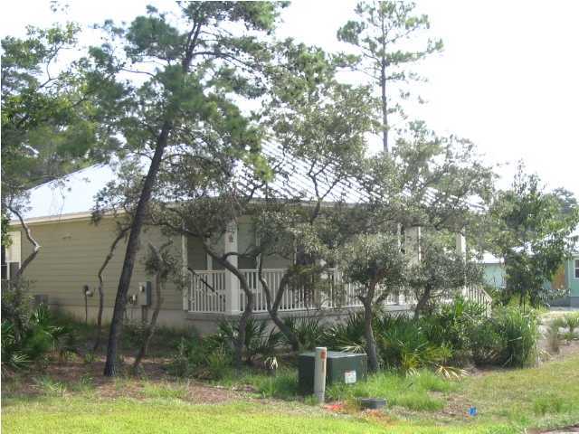 2 Spotted Dolphin Road Santa Rosa Beach, FL 32459 - Photo 4 of 6 a backyard of a house with lots of green space