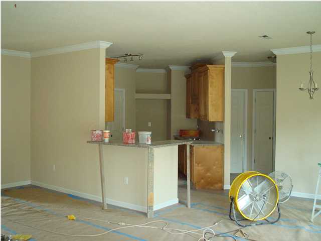 4618 Hermosa Road Crestview, FL 32539 - Photo 5 of 9 a bathroom with a granite countertop sink and a mirror