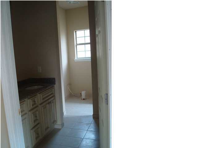 4618 Hermosa Road Crestview, FL 32539 - Photo 8 of 9 a bathroom with a toilet