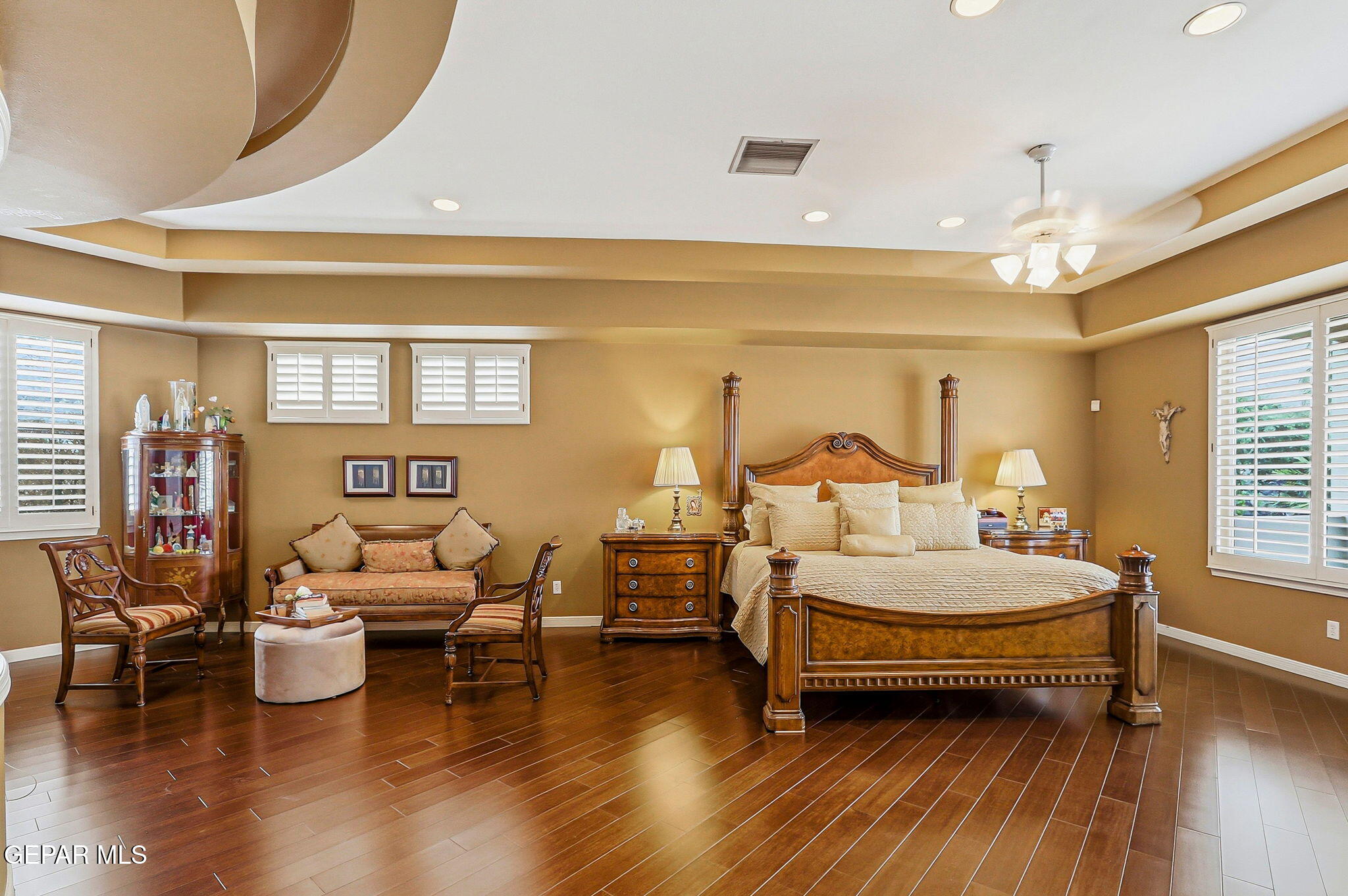 5806 Diamond Point Circle El Paso, TX 79912 - Photo 27 of 61 a bedroom with a bed and wooden floor