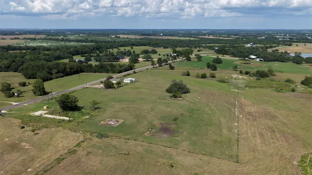 a living room with furniture rug and window