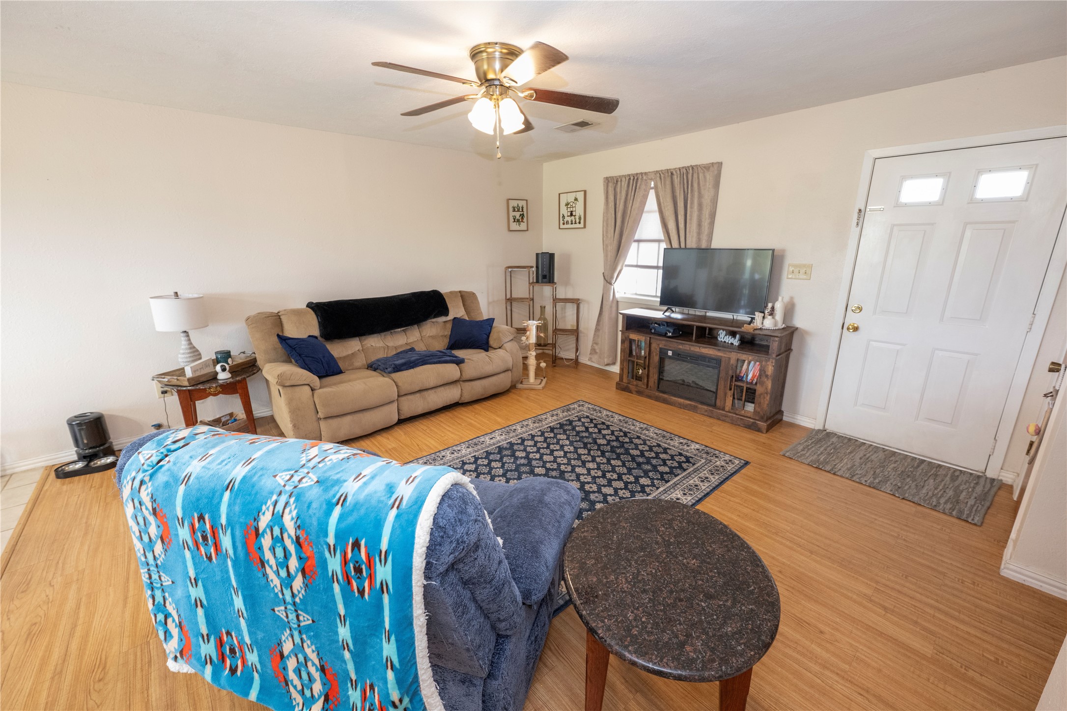 9503 Fm 389 Brenham, TX 77833 - Photo 16 of 23 a living room with furniture and a flat screen tv