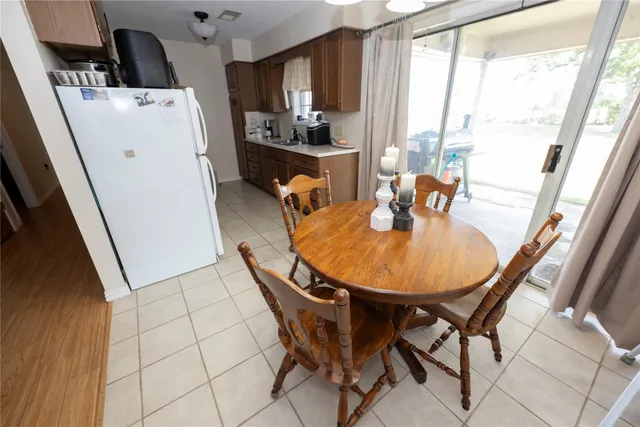 a bedroom with furniture and wooden floor