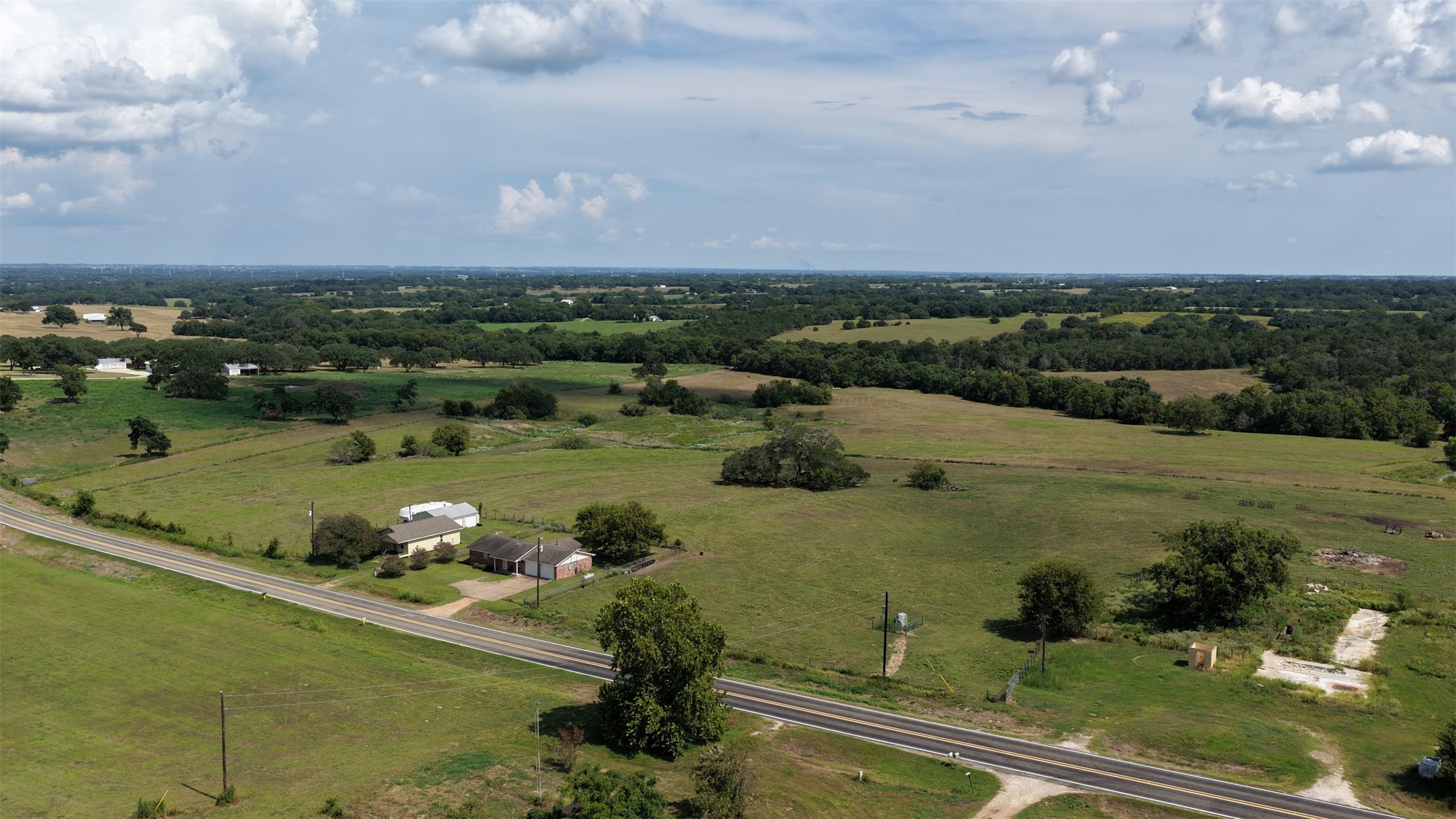 9503 Fm 389 Brenham, TX 77833 - Photo 7 of 23 an aerial view of a house with a yard