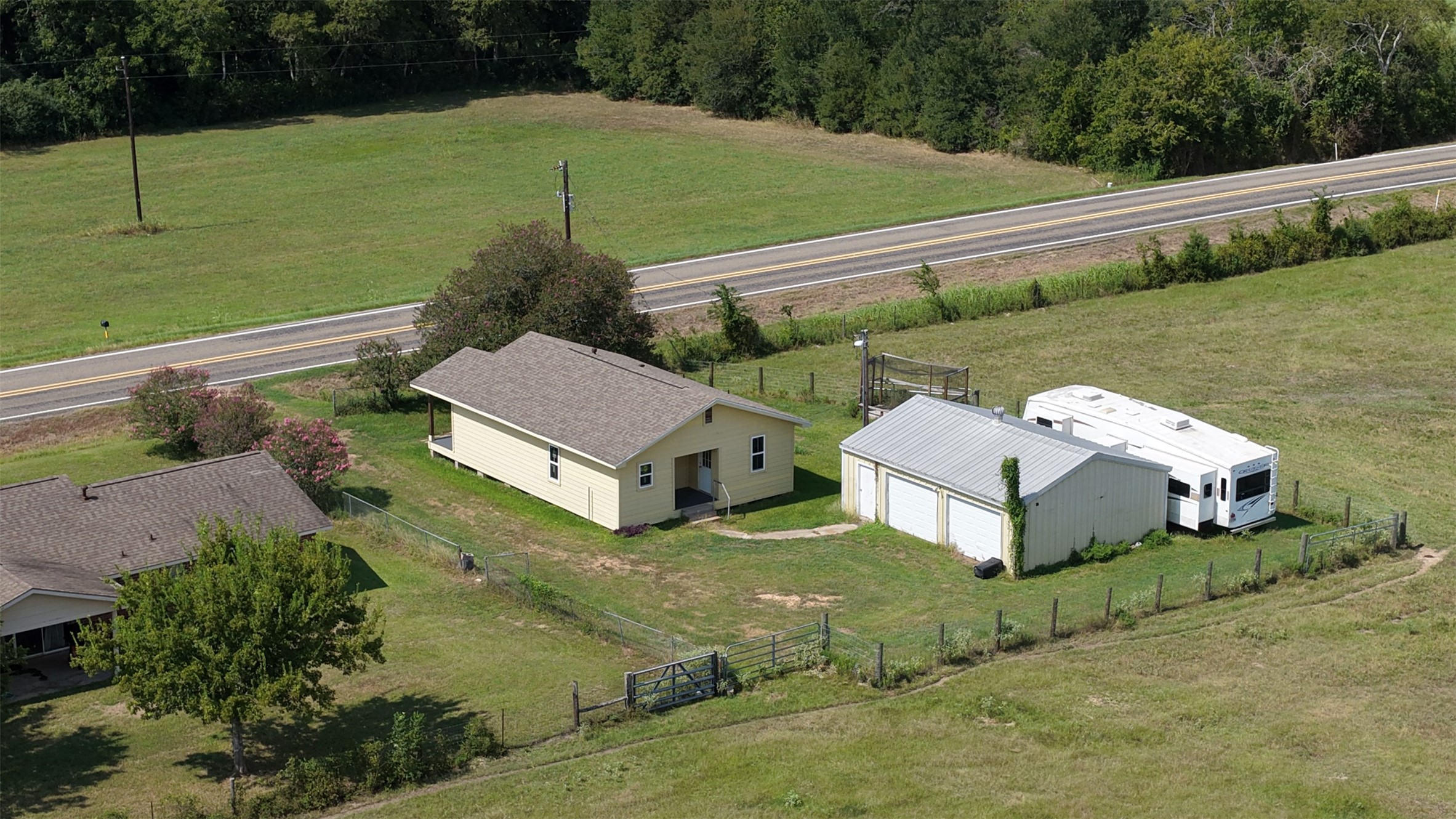9503 Fm 389 Brenham, TX 77833 - Photo 8 of 23 a view of a house with yard and street