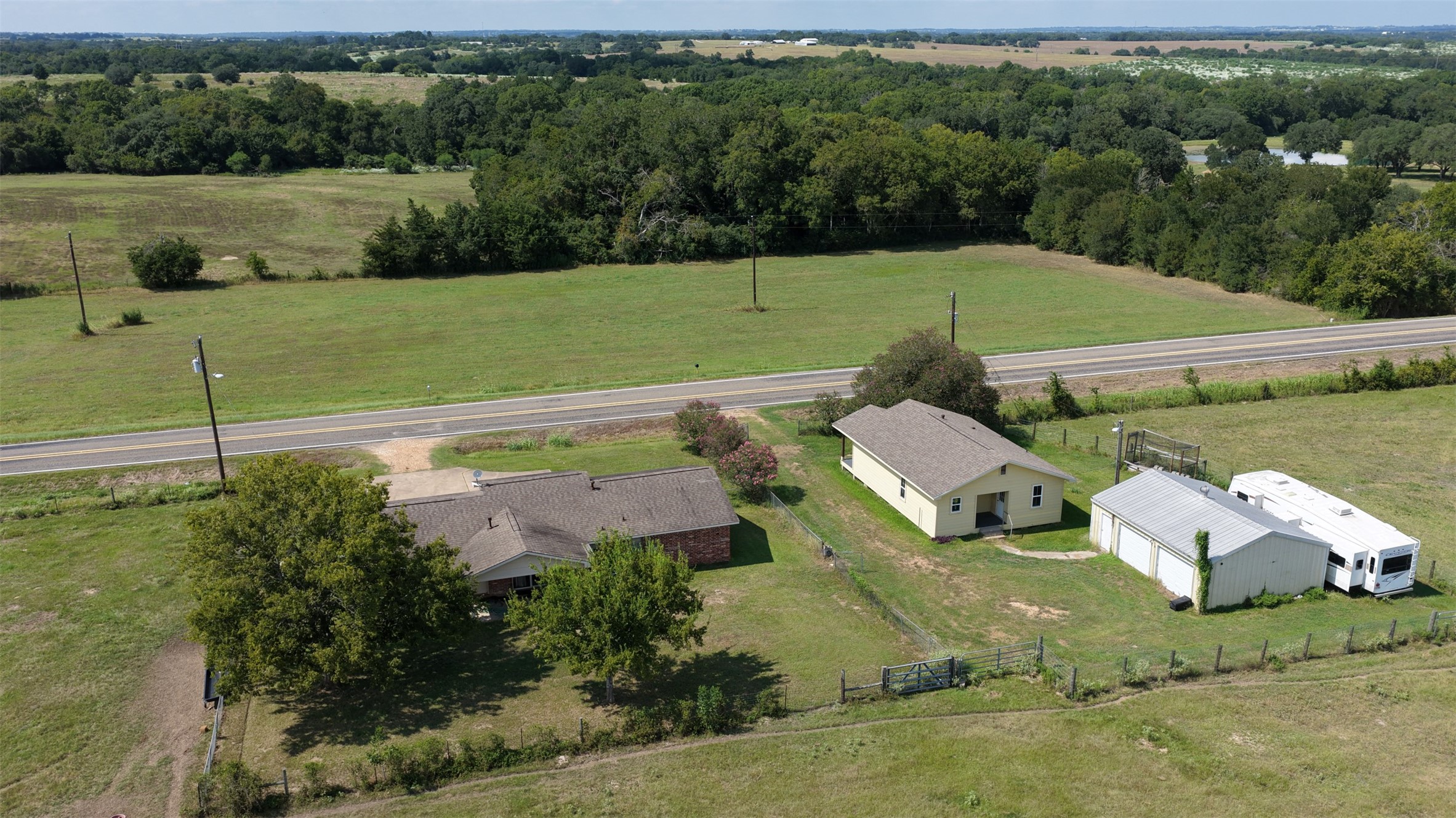 9503 Fm 389 Brenham, TX 77833 - Photo 9 of 23 an aerial view of a house with outdoor space
