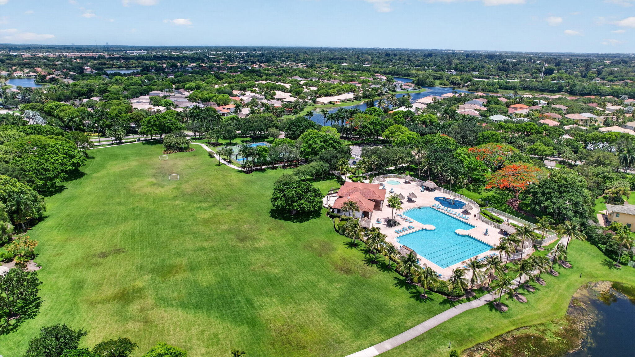 4299 Laurel Ridge Circle Weston, FL 33331 - Photo 89 of 103 an aerial view of a house with a yard