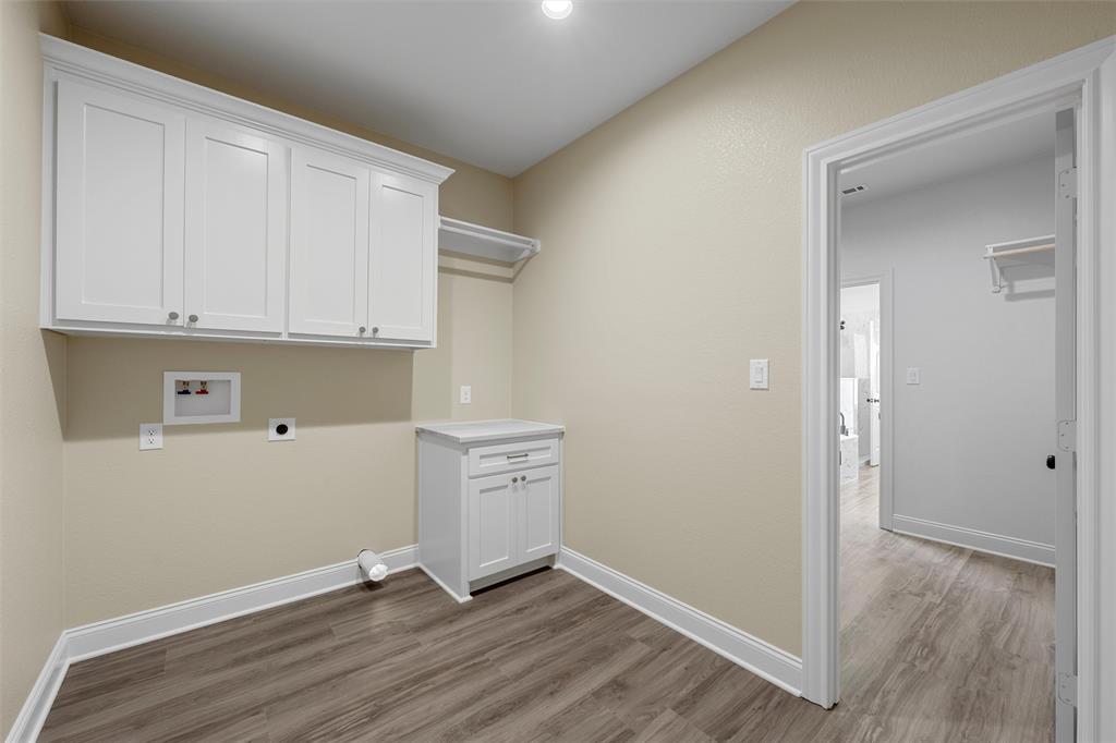 929 Northern Dancer Drive Hewitt, TX 76643 - Photo 27 of 36 wooden floor in an empty room
