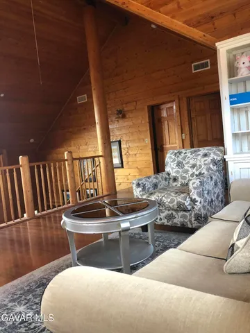 a workspace with furniture hardwood and a window