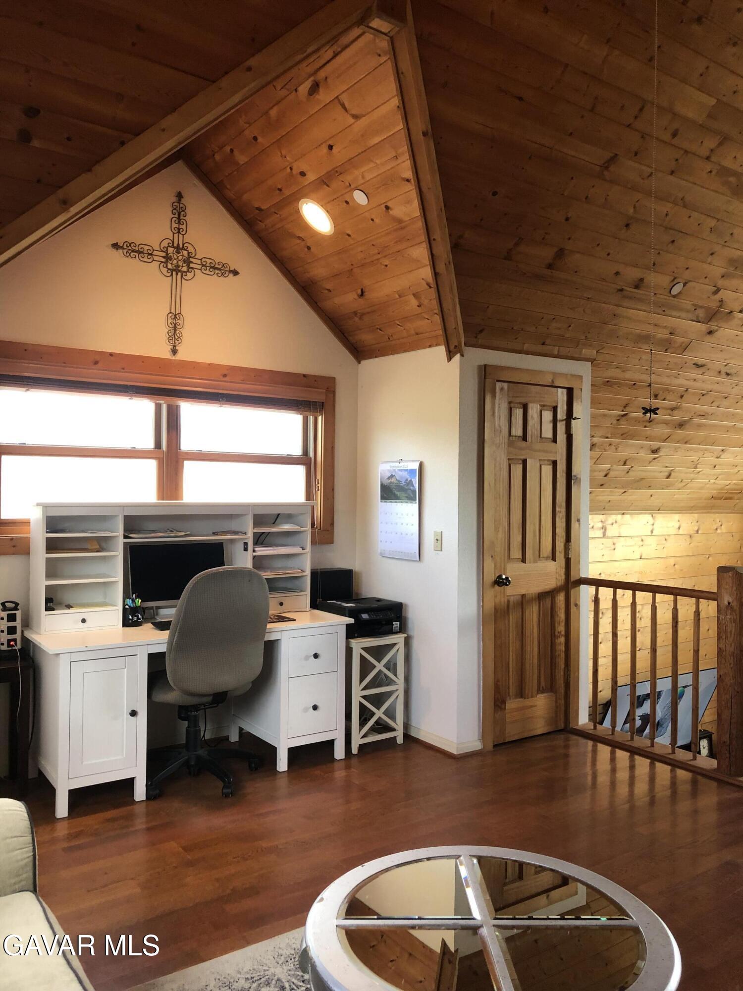 28147 Lake Wohlford Road Valley Center, CA 92082 - Photo 14 of 25 a workspace with furniture hardwood and a window