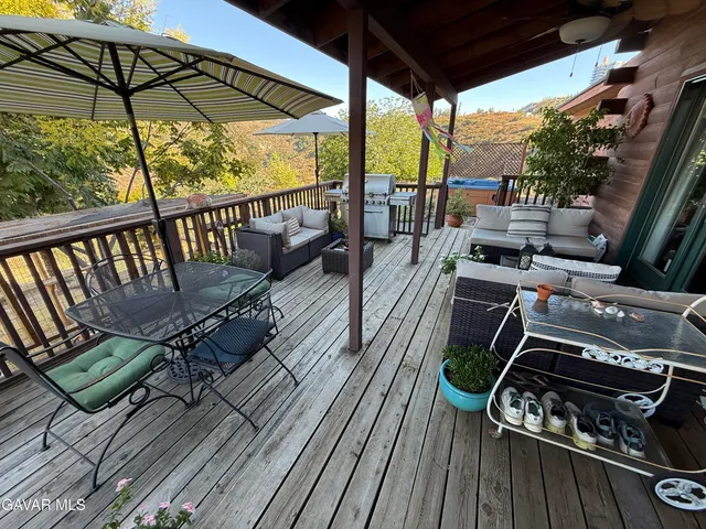 a view of a swimming pool with a yard