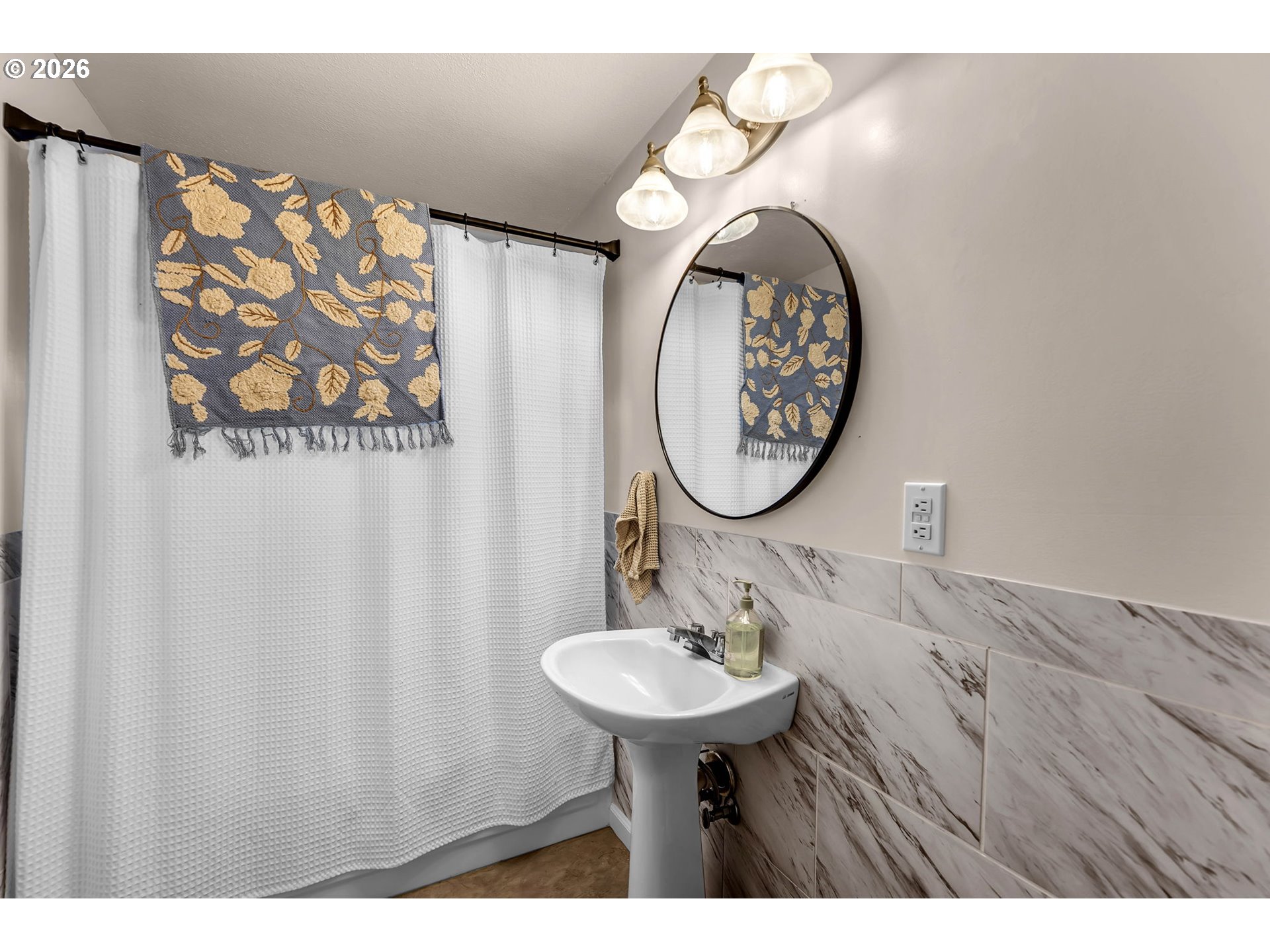 39904 Northeast Rotschy Road Yacolt, WA 98675 - Photo 22 of 48 a bathroom with a sink and a mirror